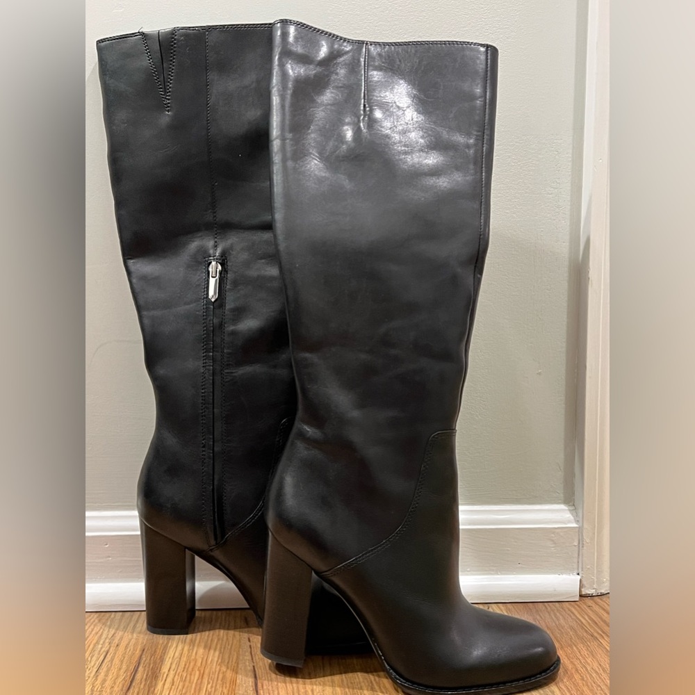 Knee high black leather heeled boots. Like new. Size 7.5